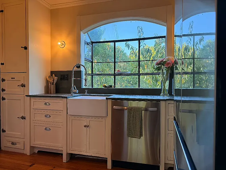 Simple and well equipped kitchen with old world charm.
