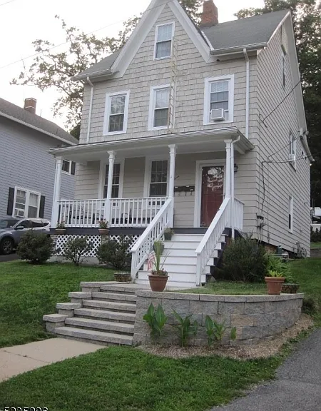 11 Center Ave — Photo 1