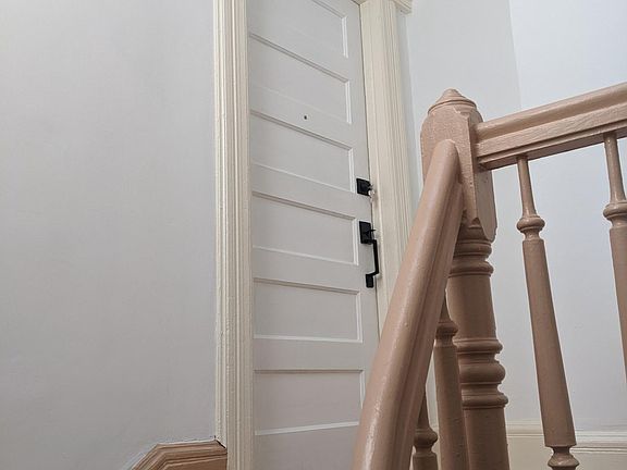 Top of the stairs + front door