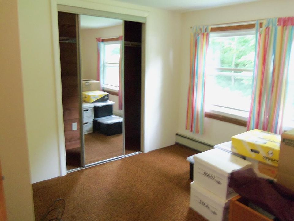 Large Bedroom with mirrored closet