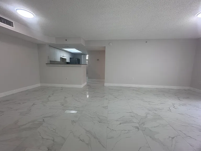 5011 Wiles Rd #207 — Photo 39