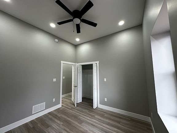 First bedroom across from kitchen:
10'11" x 10' 10"
