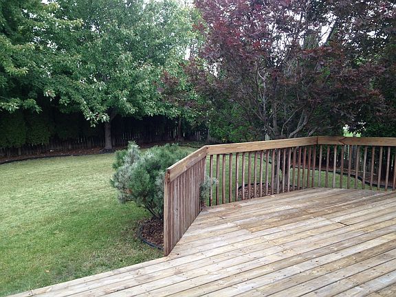 Walk out deck, fenced in backyard.