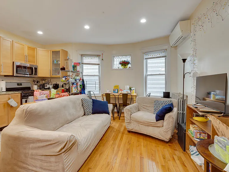 Living room and Dining room. Common areas and bedrooms are furnished.