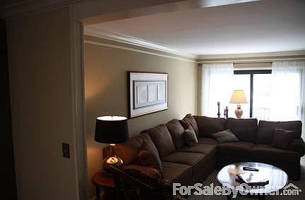 Living Room 1
						:
						Bright and Airy with Crown Molding throughout!