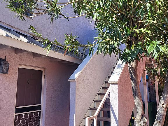 Apartment # D is located upstairs in the back.