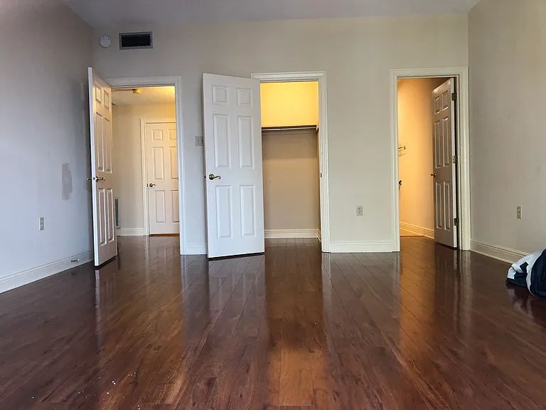 master king size bedroom suite with private bathroom and walk in closet and balcony
