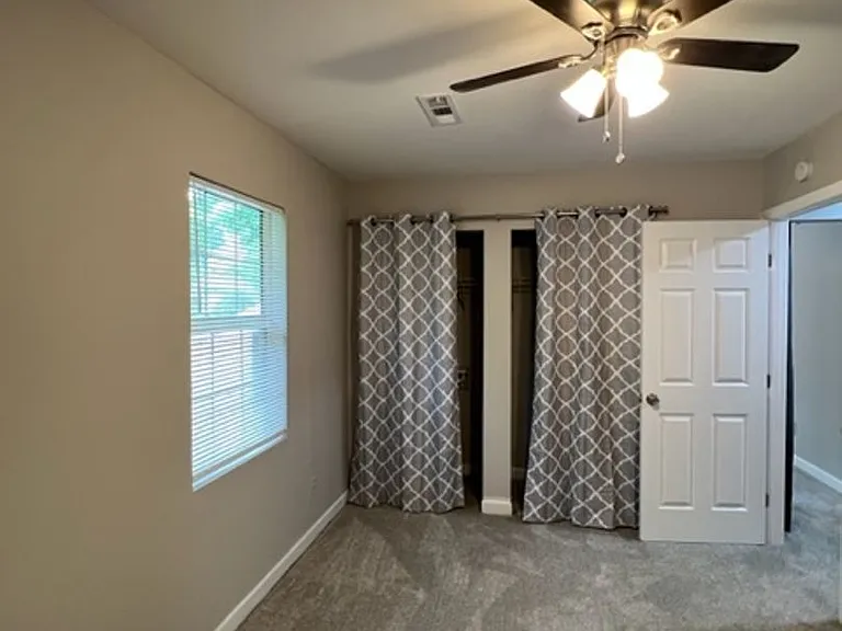 This spacious unit of a Quadplex has 2 BR and 1 Full Bath. Move In Ready! — Photo 12