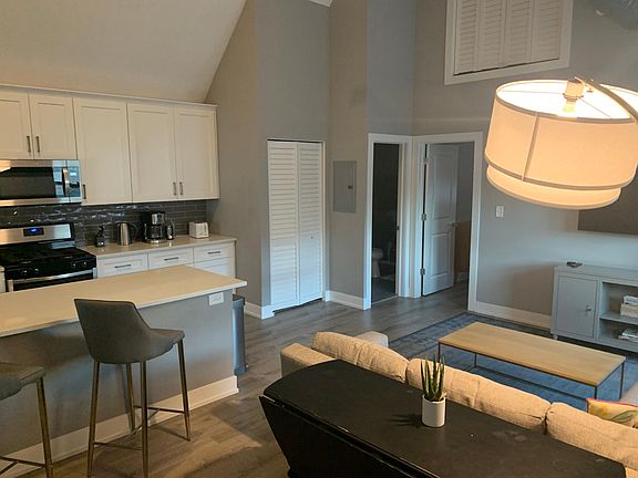 open kitchen and living room, fully furnished with all new furniture and appliances