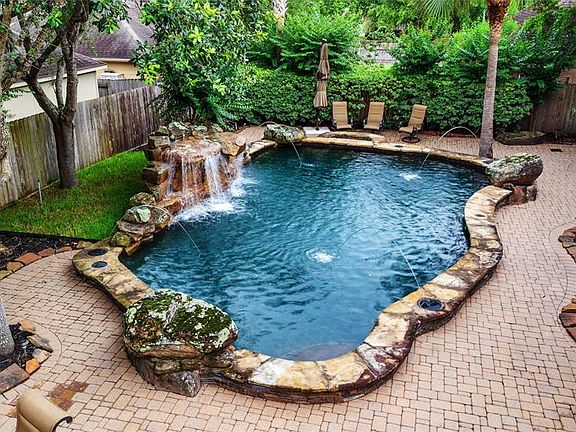 Wonderful saltwater pool with waterfalls and fountains and stone work all around.