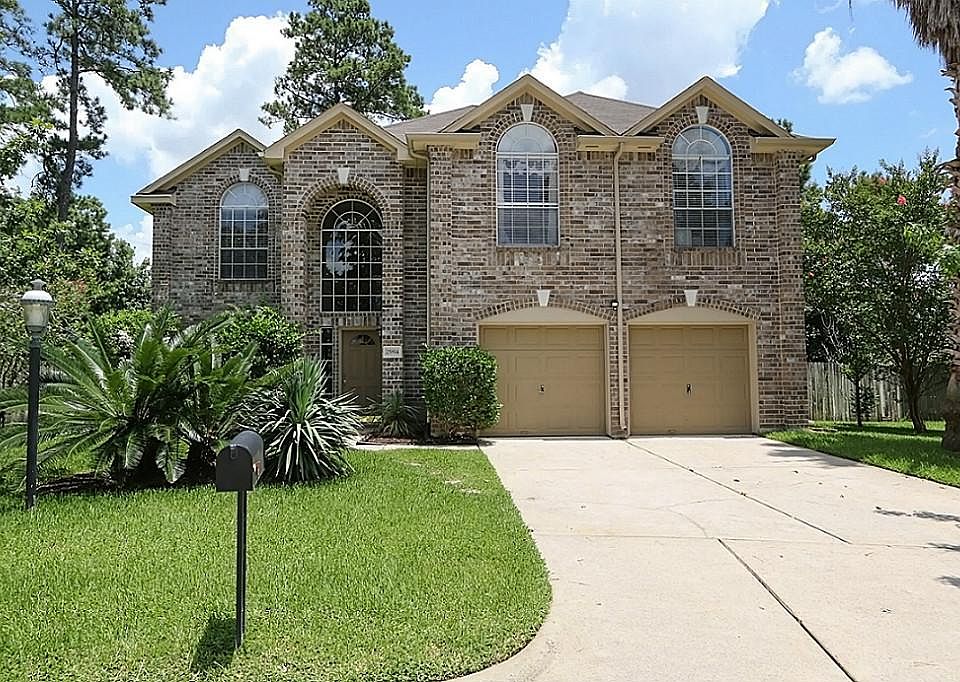 Great curb appeal with more garage space than you could ever dream of!