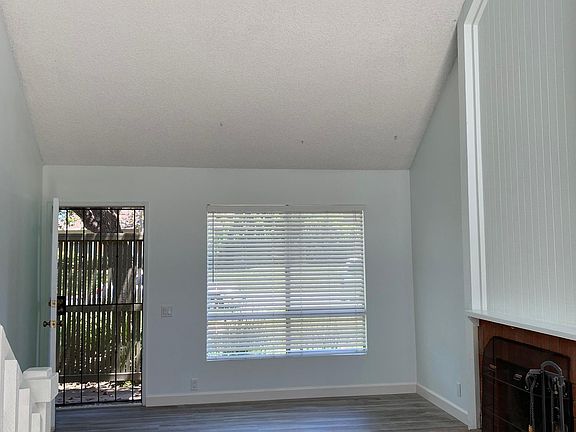 Living room with vaulted ceilings