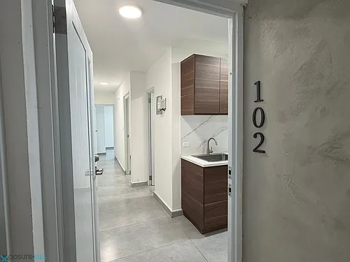 709 Calle 102 #102 Photo 1