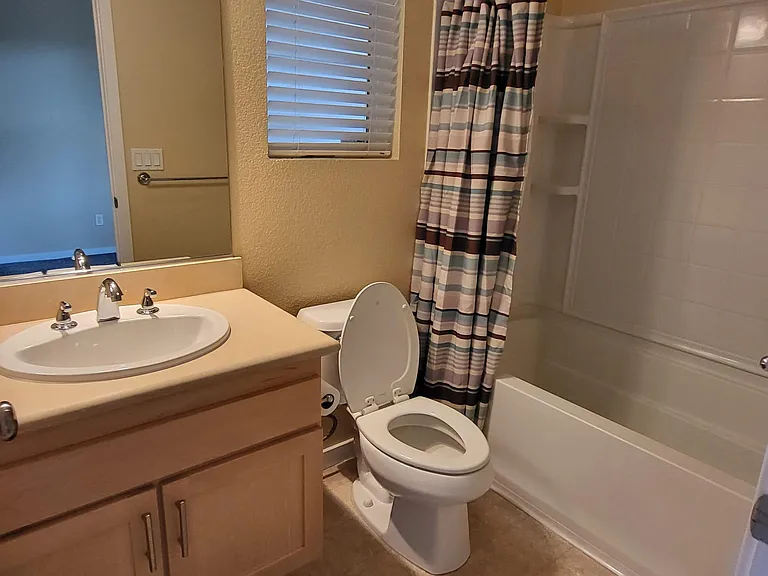 Bathroom 3 with new faucets and toilet seats