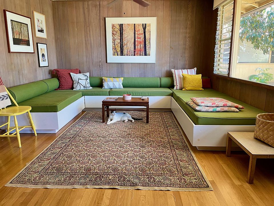 Custom-built, wrap-around couches in living room can remain, if tenant desires.