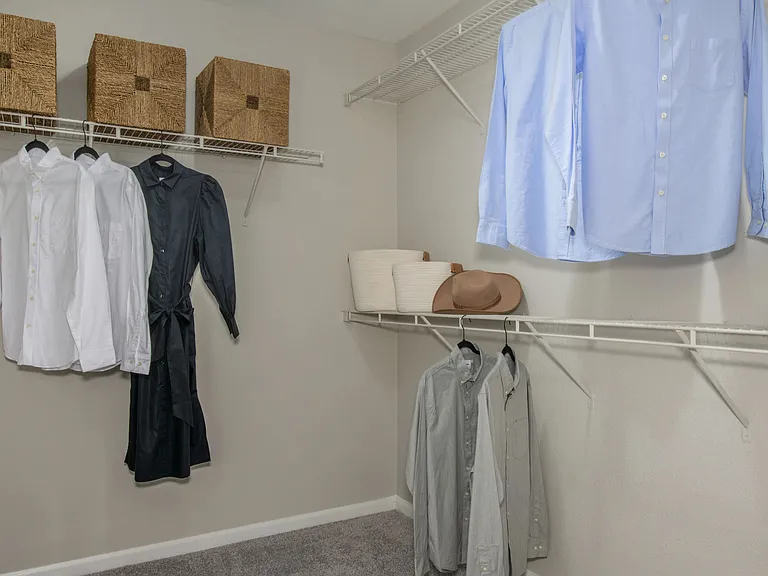 Luxuriate in master retreats adorned with massive walk-in closets boasting custom shelving for maximum wardrobe storage.