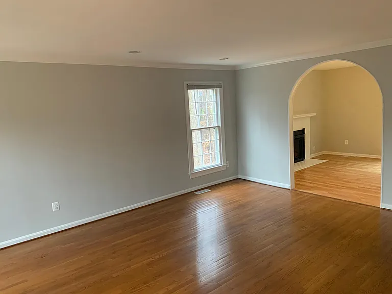 Formal Living Room adjacent to Foyer and Family Room
