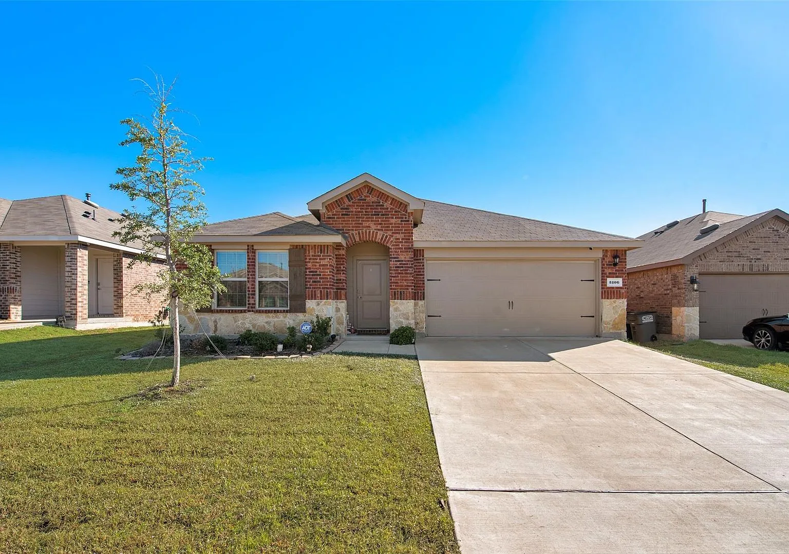 This 4-bedroom, 2-bath home is nestled within a pristine master-planned community and offers mode... — Photo 2