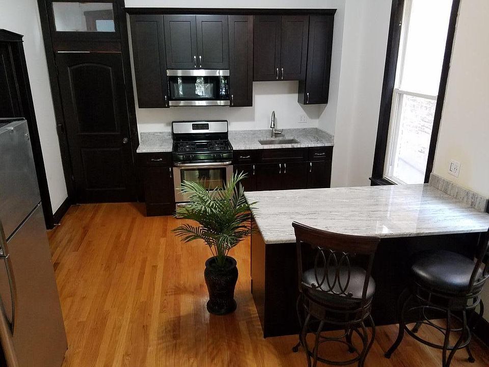 1st image of 1237 N Campbell Ave #1FLFRONT