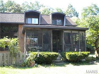 Enjoy sitting outside in a nice large screened in room right off