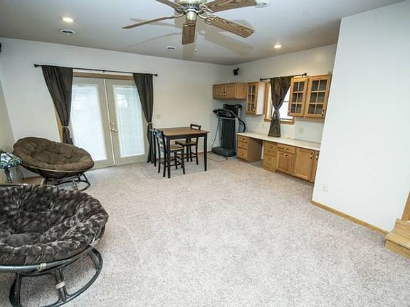 Entering this home you step into a beautiful family room (15x20) that was an addition to the original house. This living space offers built-in oak cabinets, updated floor coverings and can lighting. 