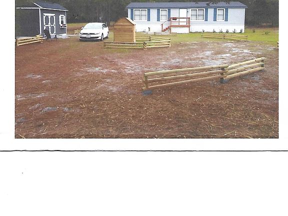 Circle Driveway / New Plants and Landscape Timber and more in progress.