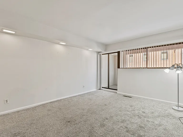 Primary bedroom with access to outdoor balcony