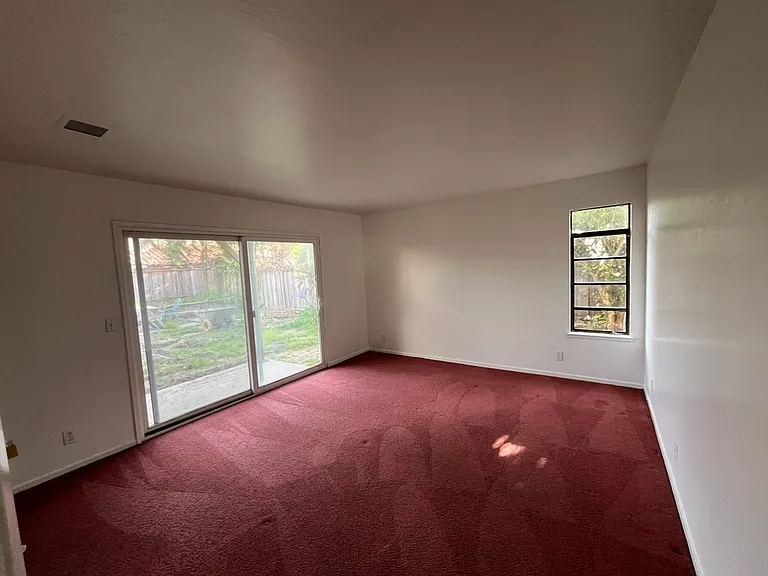Backyard facing downstairs bedroom