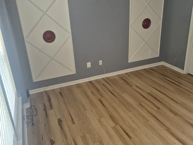 Finished basement or home office or recreation room or fitness space or guest suite