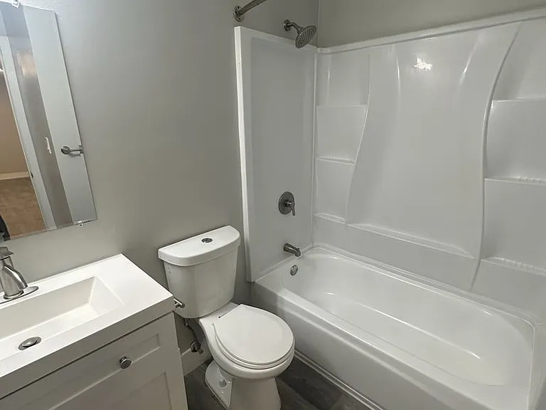 New Brigham Apartments — Photo 32