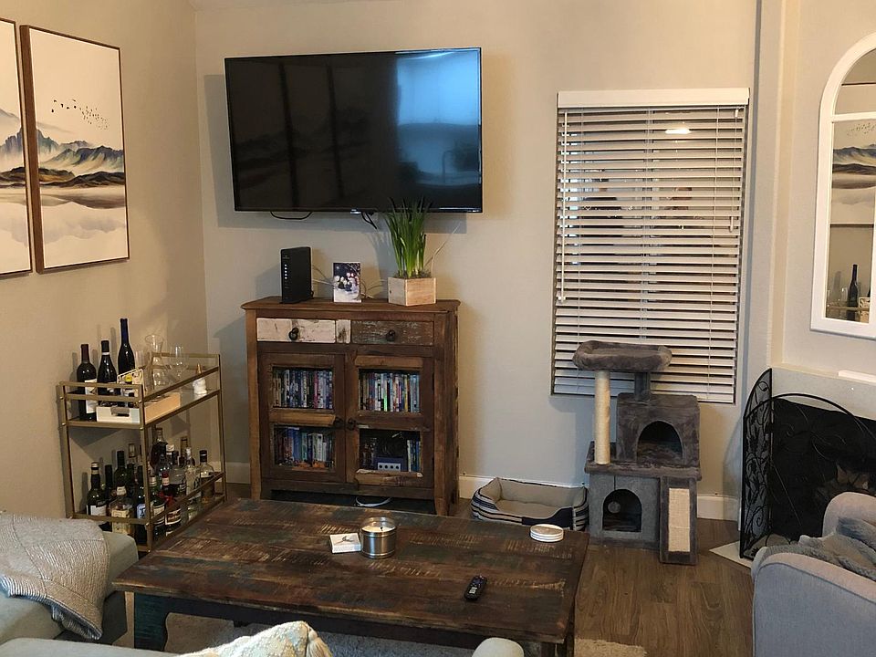 Comfortable front room includes gas fireplace