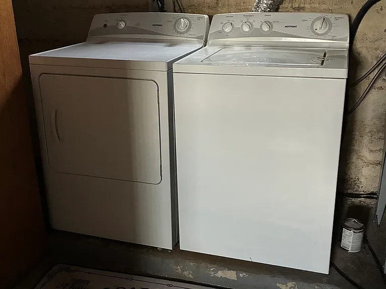 Basement partially finished and full size washer and dryer