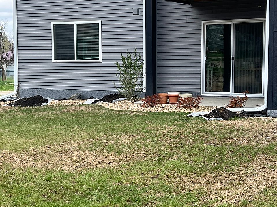 Lower level unit - current pictures reflects landscaping that is being done.