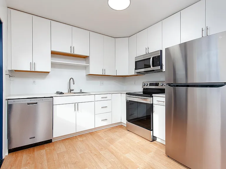 Kitchen cabinets are all high-end, self-closing. The overhead kitchen light includes a dimming feature.