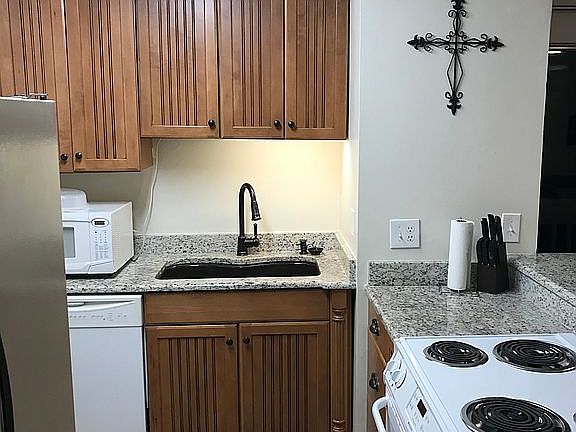 Custom cabinets and sink/fau