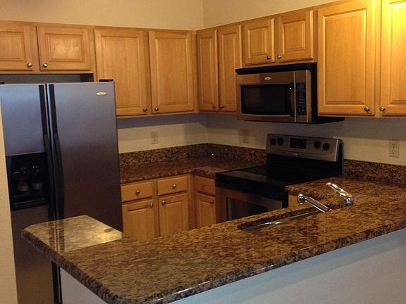 kitchen with granite countertops and stainless steel applian