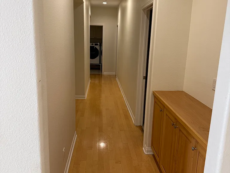 hallway to downstairs bed and bath rooms