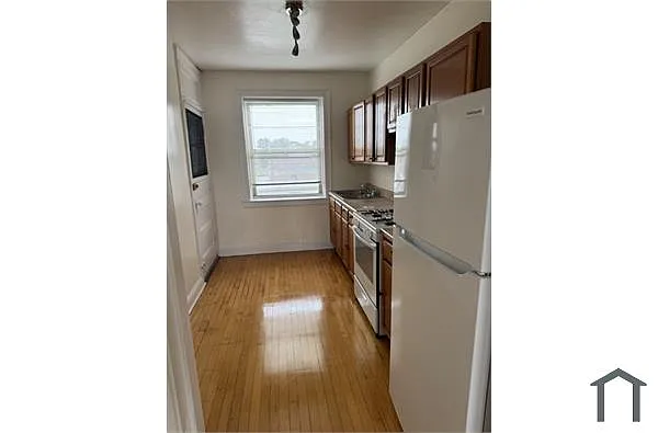 Building Photo - 2957 N Major Ave #3