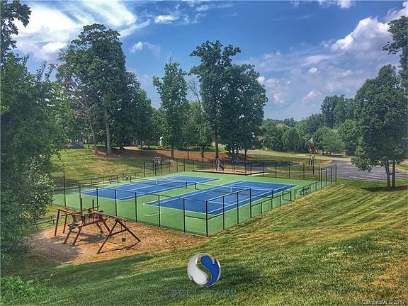Walking distance to the 2 play grounds, tennis courts, and walking trails in the center of the neighborhood!
