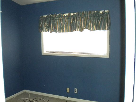 Bedroom with large walk in closet