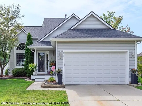671 Winding River Dr, Williamston, MI 48895