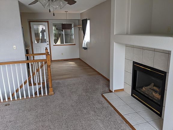 view shows space for dining table, and door to sunroom.