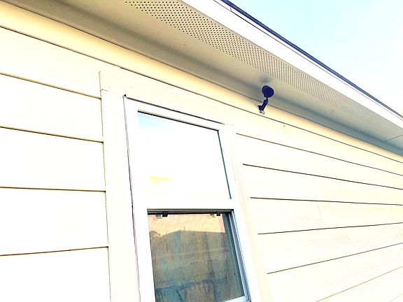 Backdoor above kitchen window camera.
