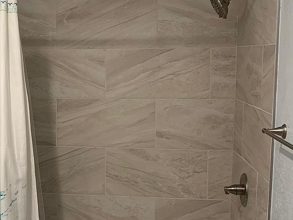 bathtub in hallway bath