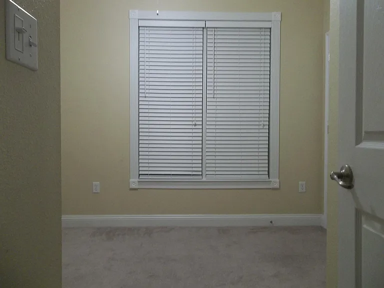 Smaller third bedroom. This room is great for an office or a nursery.