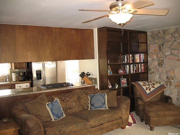 The family room is open to the updated kitchen.  Bookshelves offer a display area for your books and treasures.