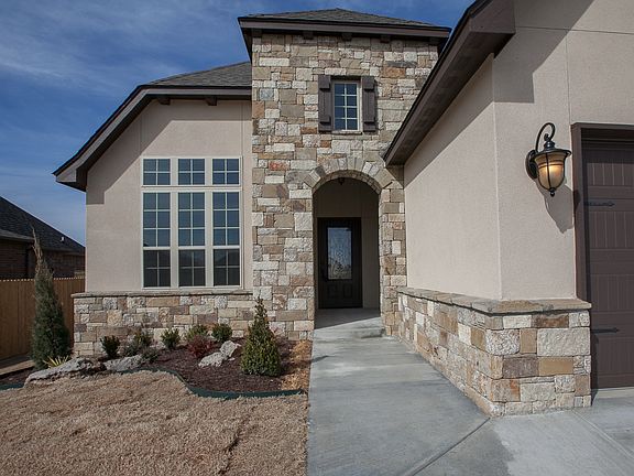 Stucco accented with beautiful stone work