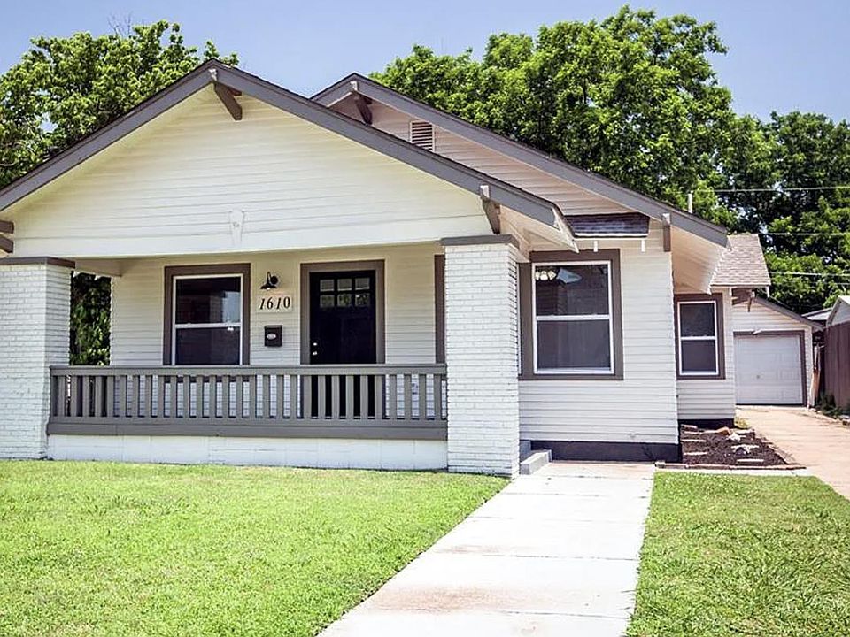 Custom front porch swing added since photo.