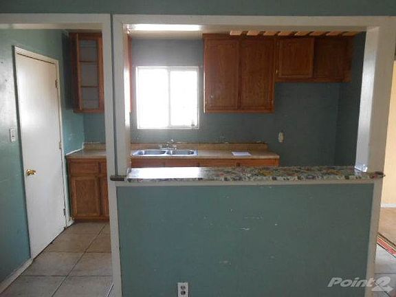 Opens to Dining Room