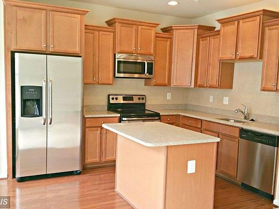Kitchen with SS appliances